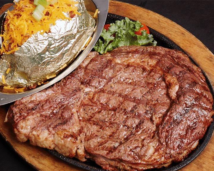 Things To Do https://heavenscabins.icnd-cdn.com/images/thingstodo/Alamo-Steakhouse-Steak.jpg